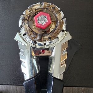 Silver and Black Toy with Red Accent